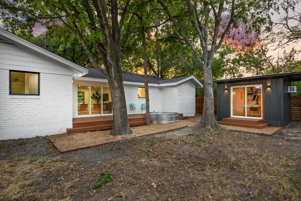 Backyard exterior view of home angle 3